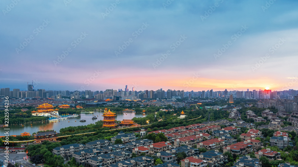 The urbanization process of ancient Chinese city of Xi'an, ancient architecture, modern residential buildings, beautiful lakeside