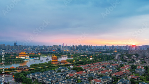 The urbanization process of ancient Chinese city of Xi'an, ancient architecture, modern residential buildings, beautiful lakeside