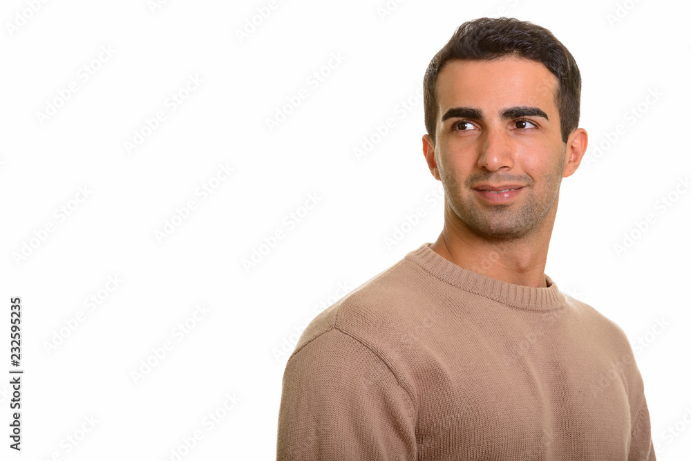 Portrait of young handsome Persian man thinking Portrait of young handsome Persian man thinking