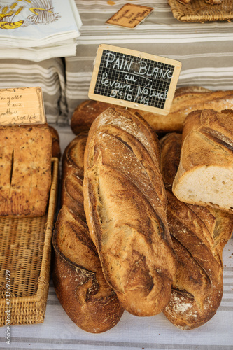 Fresh traditional french bread selling on a marketplace