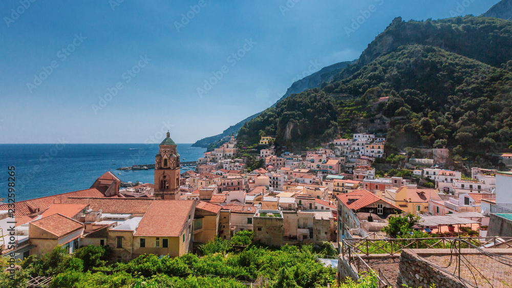Fototapeta premium Houses of the town of Amalfi, Italy, by mountains and sea