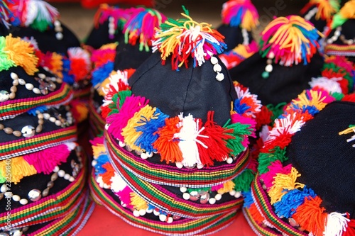 Colorful handcraft fabric traditional hat at souvenir shop in Thailand. 