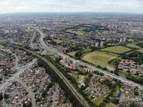 Aerial photo of the town of Seacroft near Crossgates in Leeds, showing houses, streets and roads.