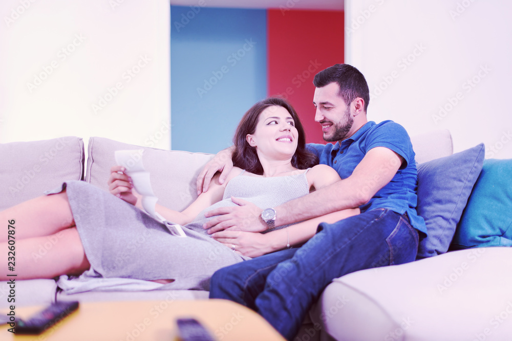 pregnant couple looking baby's ultrasound pregnant couple looking baby's ultrasound
