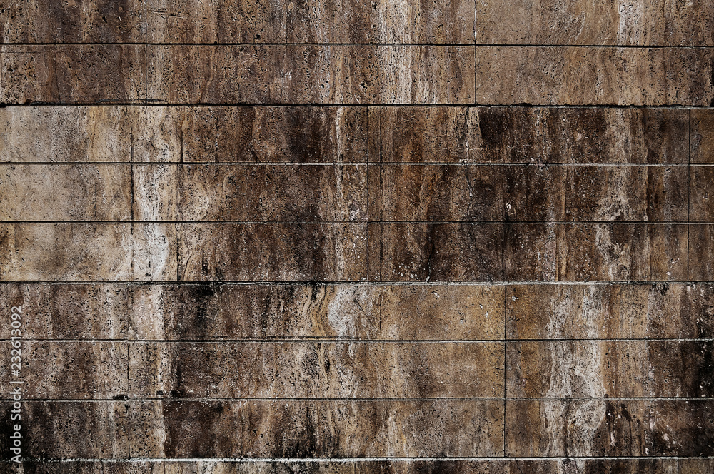 Obraz premium rough old contrast stone wall