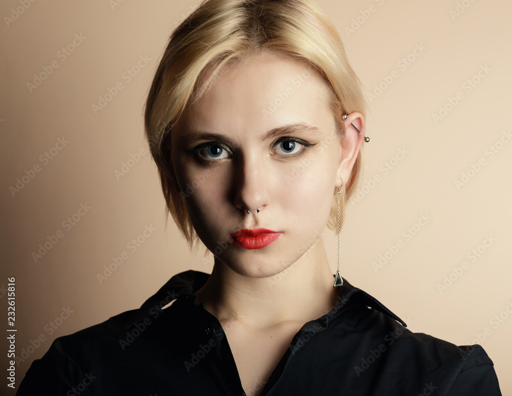 Portrait of a beautiful young woman with blue eyes. Portrait of a beautiful young woman with blue eyes.