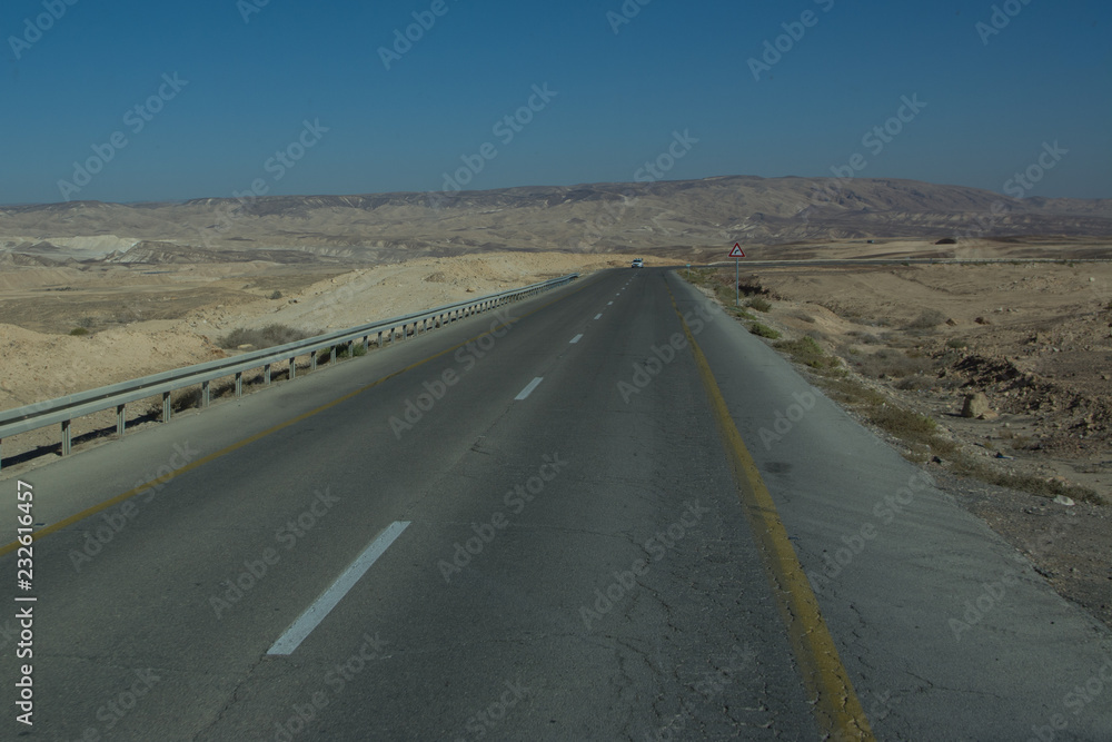 Wide view of desert road through the Isreal southwest.