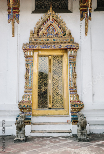 Golden ornament of temple porch photo