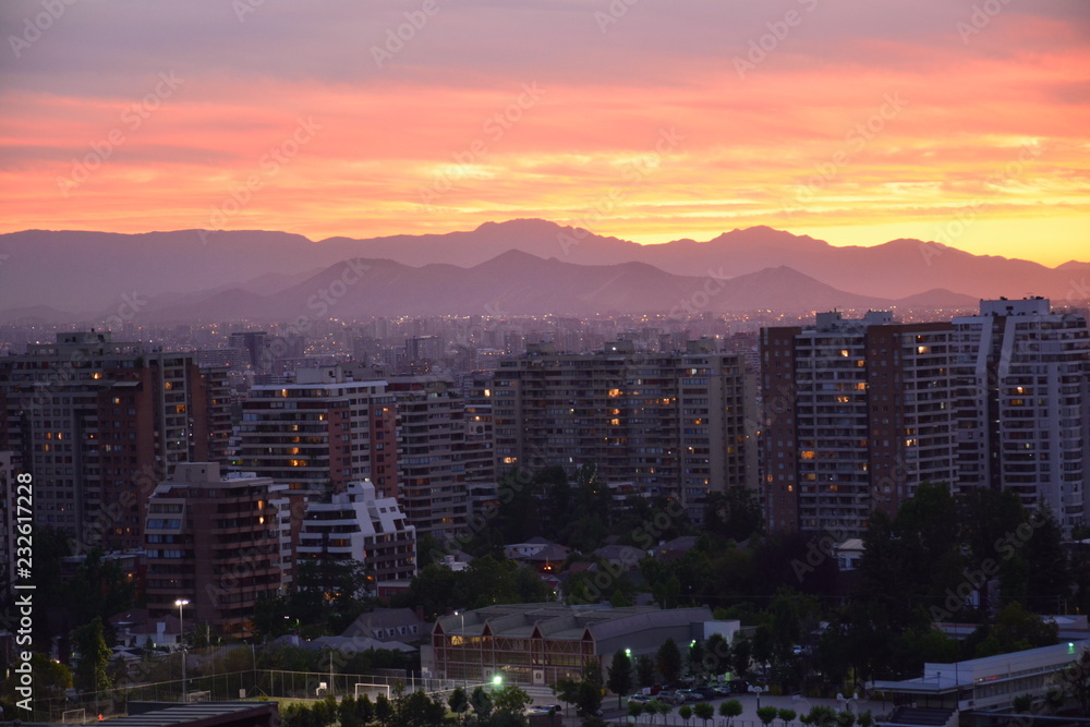 Obraz premium Sunset clouds and cityscape