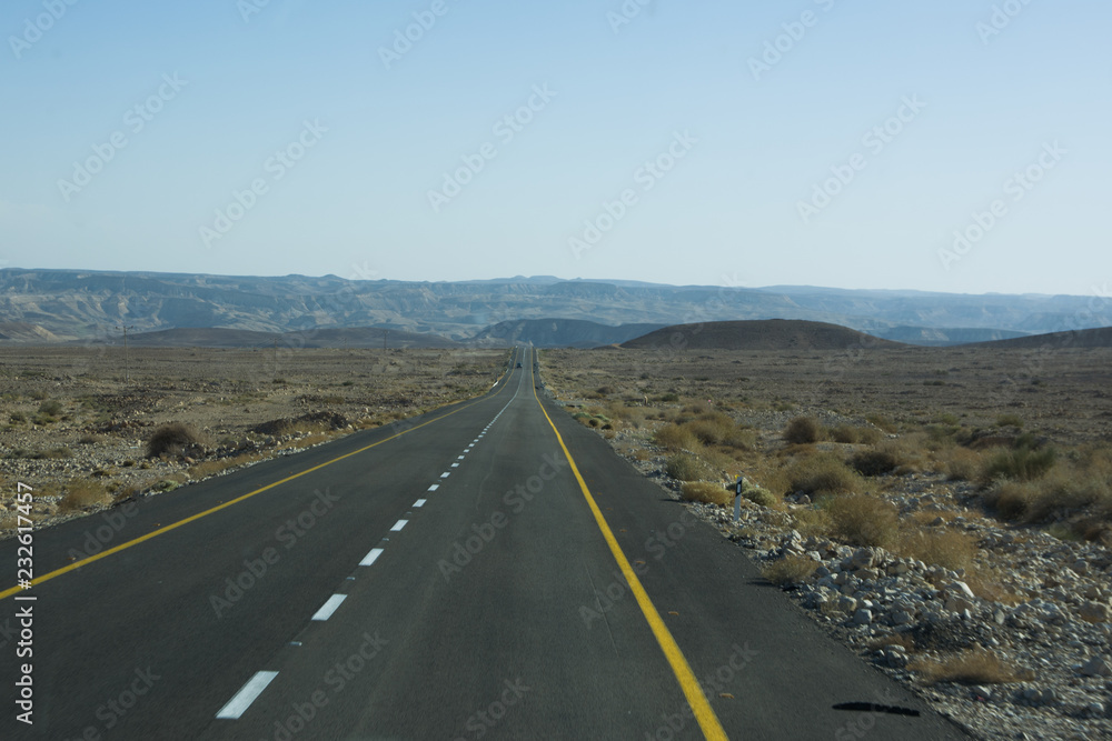 Wide view of desert road through the Isreal southwest.
