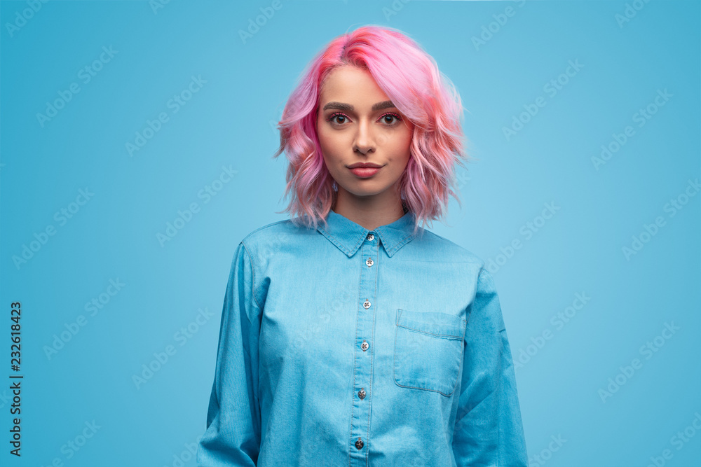 Modern millennial woman with pink hair Modern millennial woman with pink hair