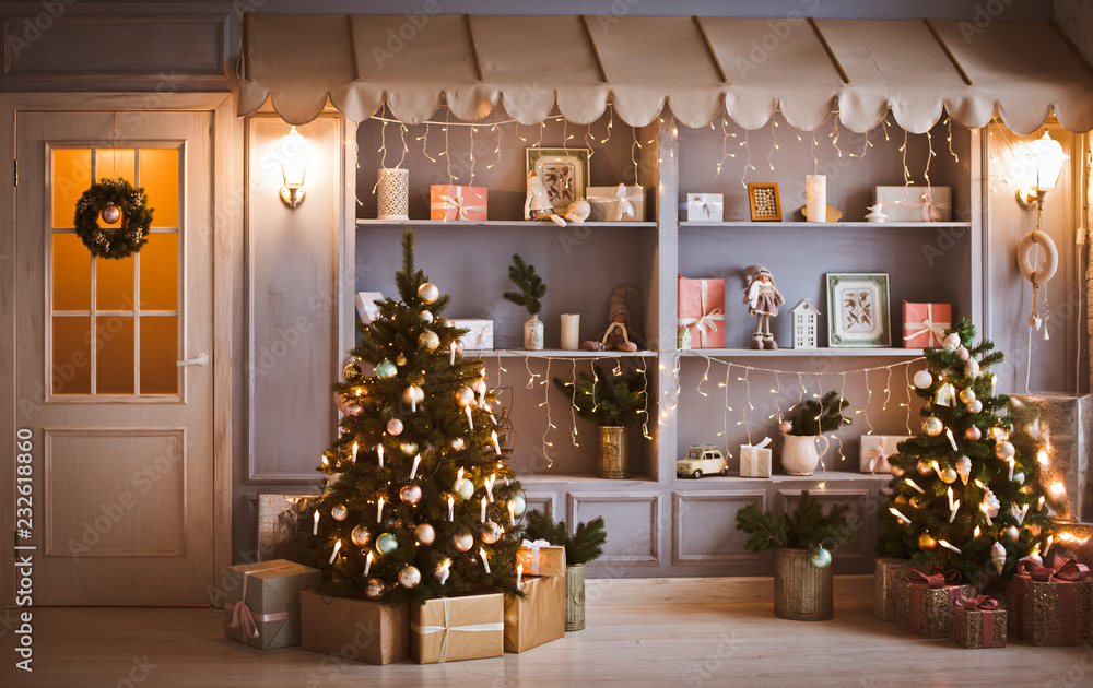 Christmas background and new year interior. Celebration gifts festoon. Shelves with decorations and a door with a wreath of spruce.