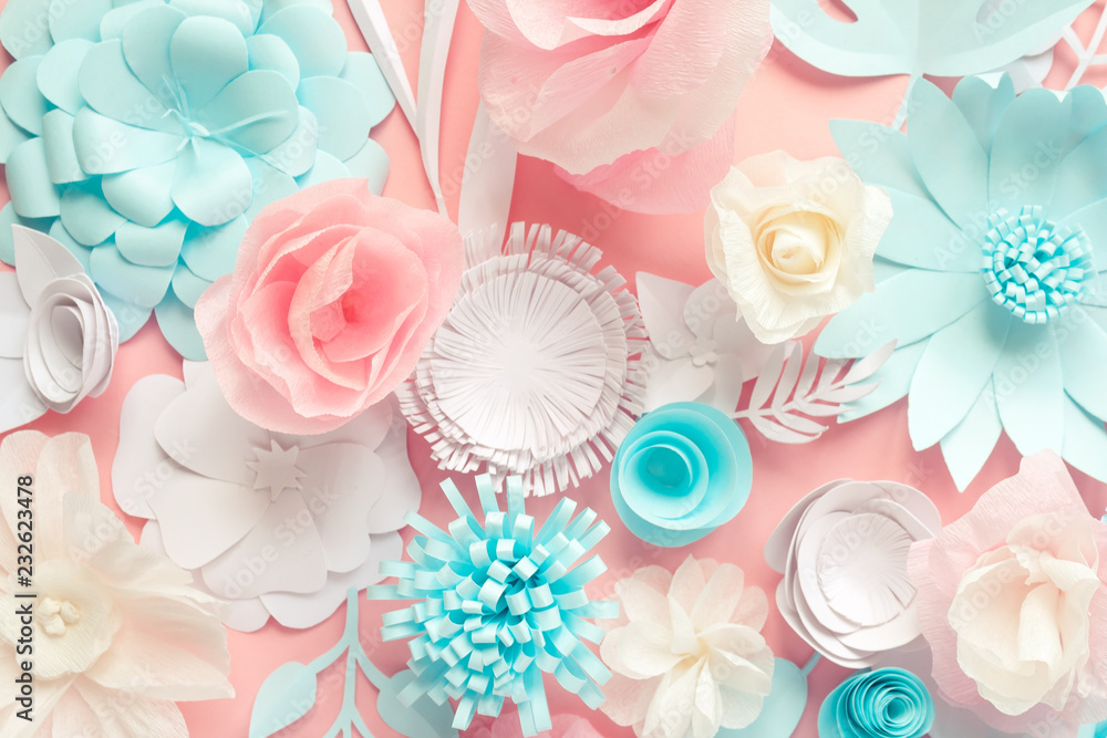 blue, pink and white paper flowers on pink background blue, pink and white paper flowers on pink background