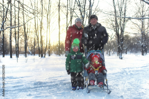 Young family in winter park