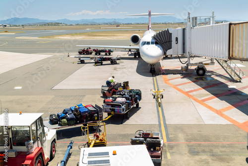 Slika na platnu Airplane being prepared for take off at Townsville Airport, Australia