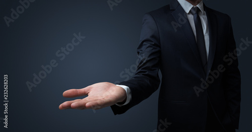 Businessman without head holding something without theme