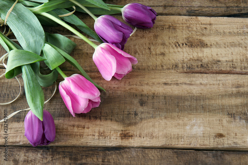 Fototapeta Naklejka Na Ścianę i Meble -  bouquet of tulips on wooden background