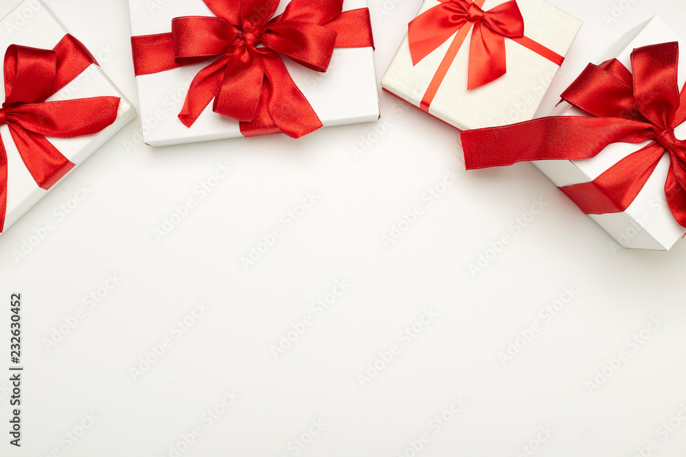 festive gift boxes with red bows festive gift boxes with red bows