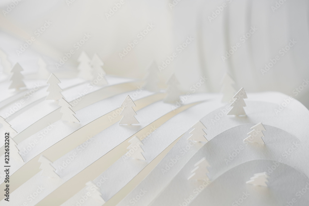 © Stocksy - White Winter snowy landscape made of paper © Stocksy - White Winter snowy landscape made of paper