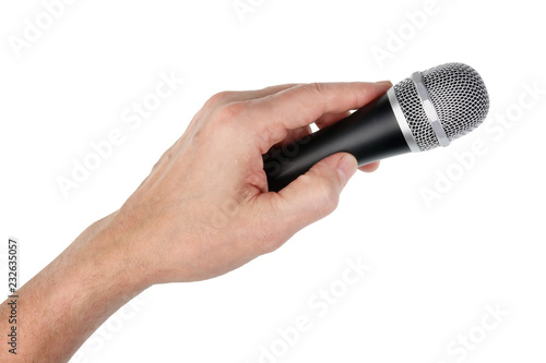 Konstfotografi Elderly male singer holds silver  vocal dinamic  microphone in his hand
