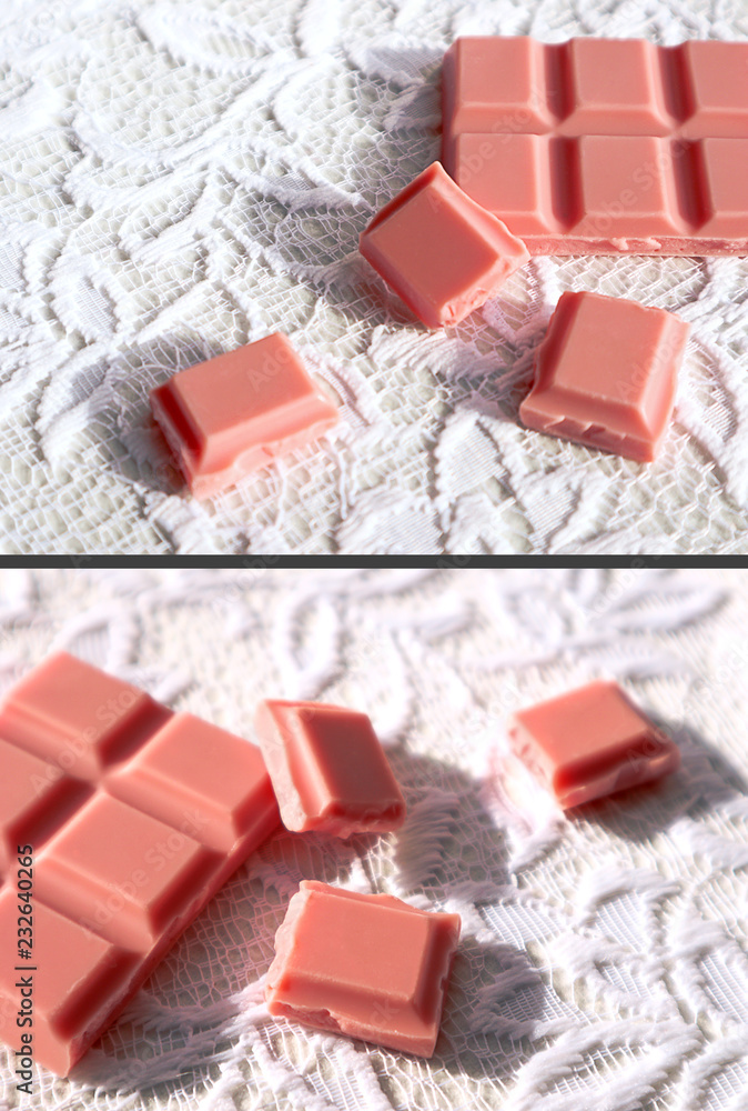 Pink chocolate bar and pieces on white lace. Close-up view of of luxury candy dessert. Pink chocolate bar and pieces on white lace. Close-up view of of luxury candy dessert.
