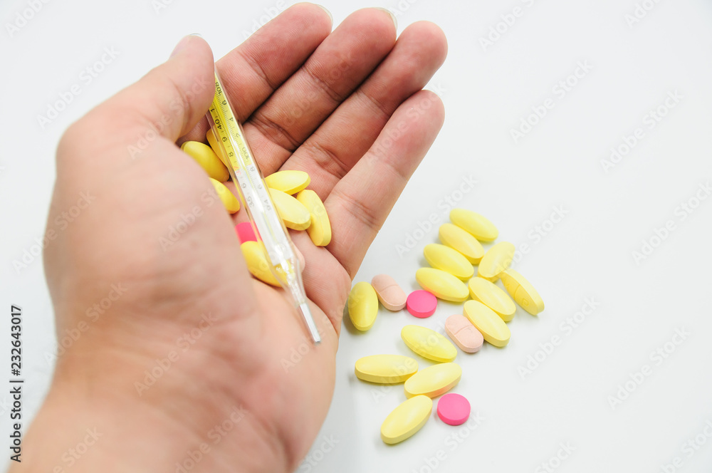 Colorful pills and medicines in the hand Colorful pills and medicines in the hand