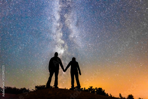 Silhouette of Couple Holding Hands With Milky Way Galaxy Night Stars