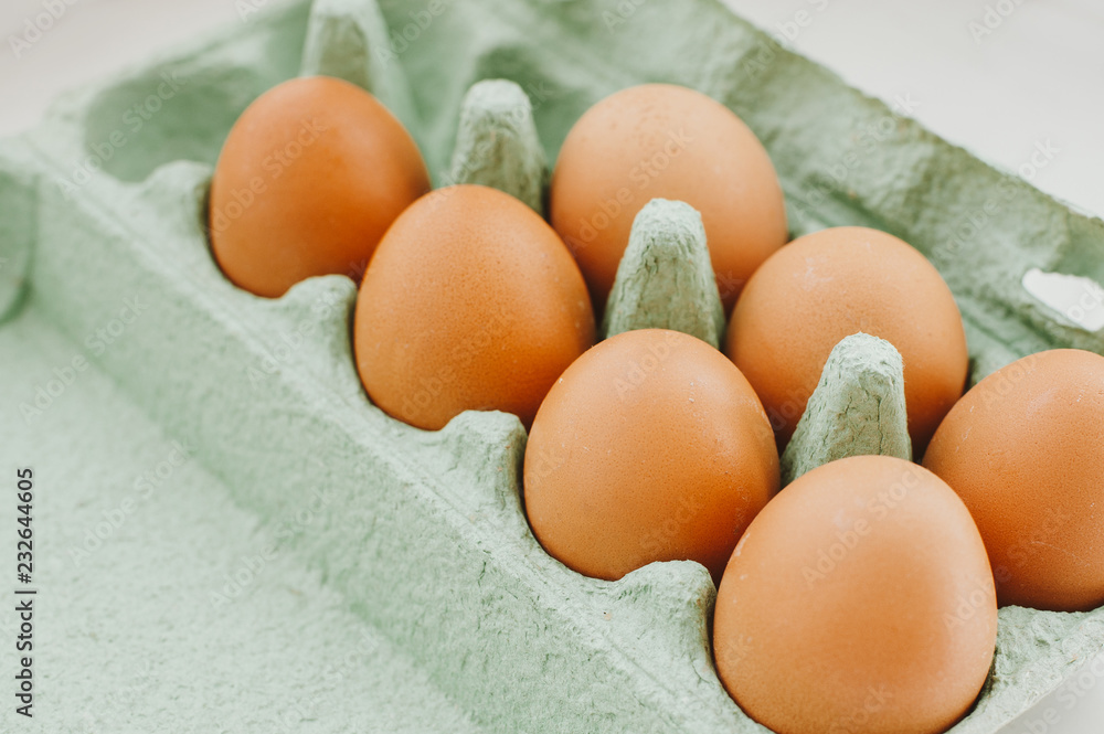 Eggs on green container