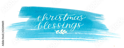 Holiday inscription Christmas blessings, made hand lettering on blue watercolor background