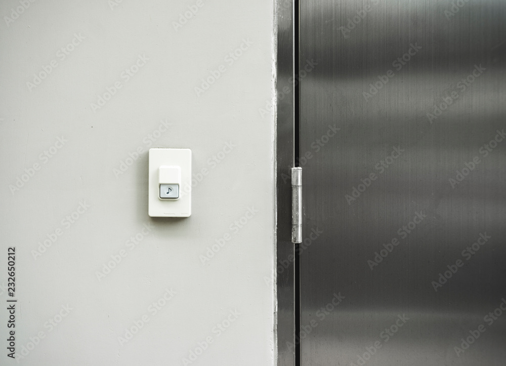 Fotografía doorbell or buzzer on wall texture background