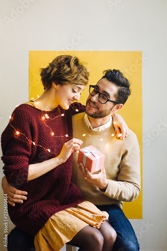 Loving couple celebrating Christmas together photo