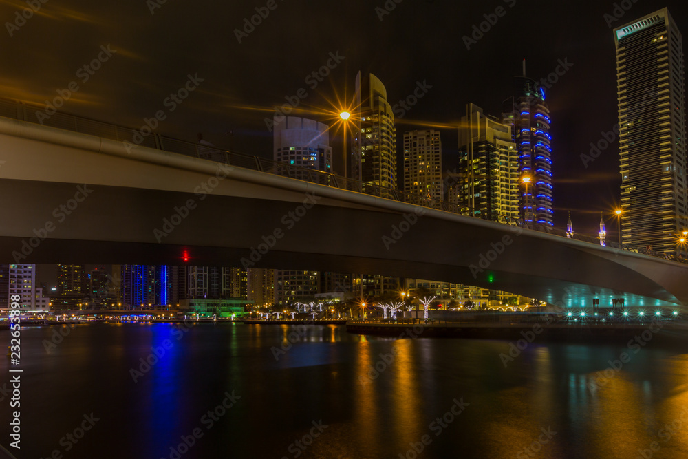 Dubai Marina with bridge at night, UAE