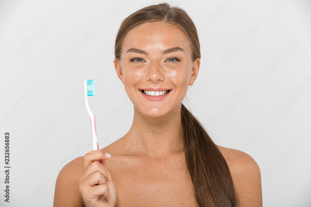 Portrait of a smiling young topless woman Portrait of a smiling young topless woman