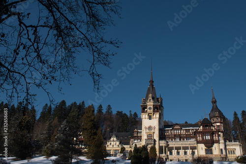 Dramatic photo of Peles Castle in winter season. Romania, Sinaia