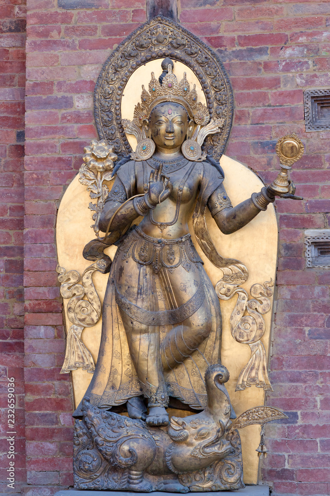 Ancient statue of goddess Ganga in Patan, Nepal