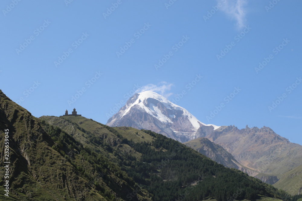 Stepantsminda church in Georgia mountains