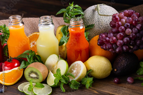 Fototapeta Naklejka Na Ścianę i Meble -  Healthy foods with juices placed and group of fruits