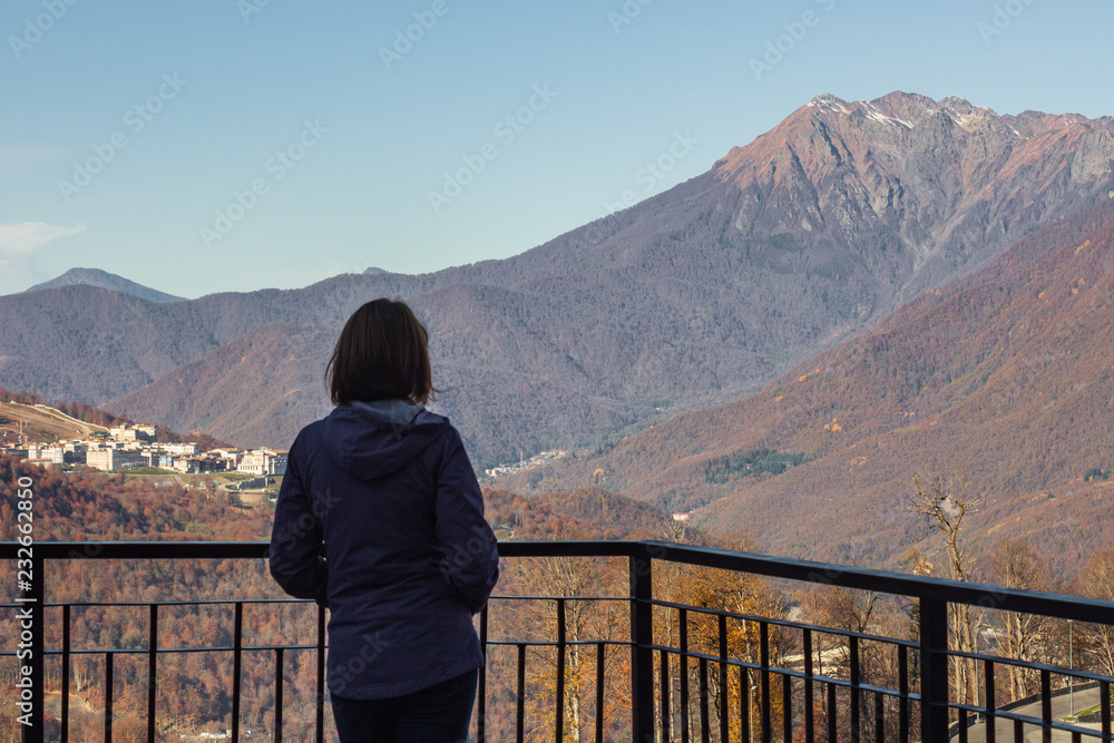 Woman at the top of the mountain. Rosa Khutor.