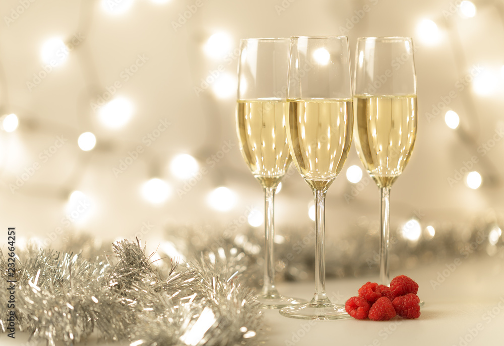 Three glasses of Christmas champagne with bokeh Three glasses of Christmas champagne with bokeh