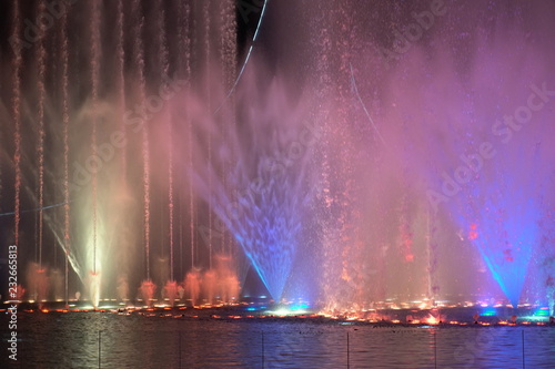 colored water artificial evening lighting fountain water