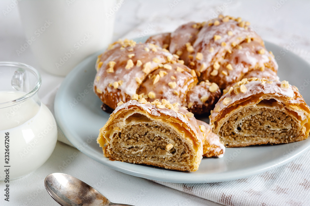 Polish traditional Saint Martin's croissants.Traditional pastries with white poppy seeds and nuts. Polish traditional Saint Martin's croissants.Traditional pastries with white poppy seeds and nuts.