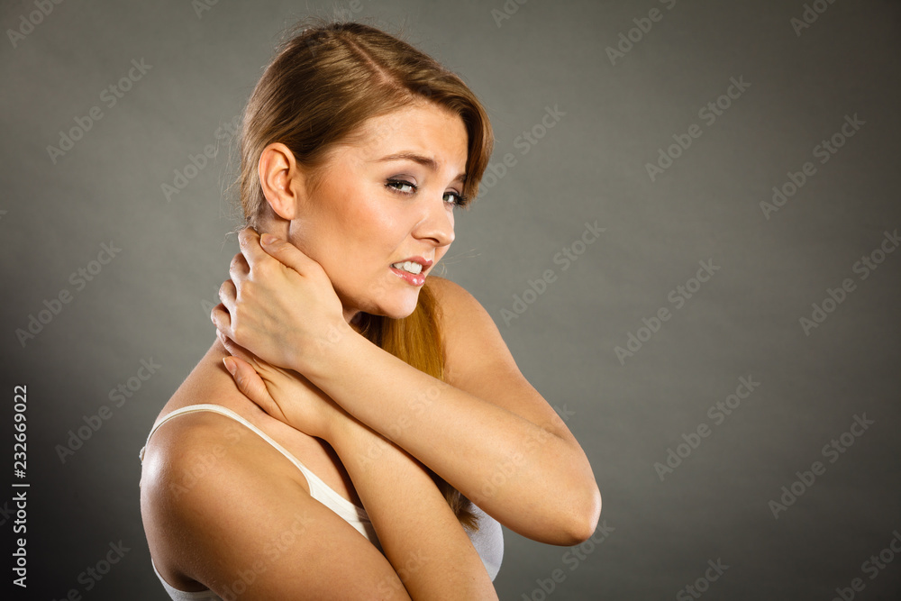 Fototapeta premium Woman suffering from neck pain