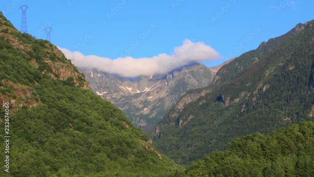 Timelapse of clouds over mountain peak in Pyrenean, Ariege in the southern of France Timelapse of clouds over mountain peak in Pyrenean, Ariege in the southern of France