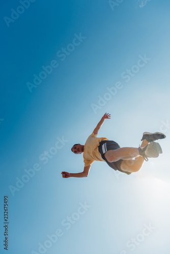 Free runner make parkour in the air