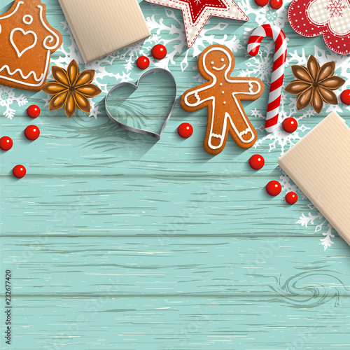 Christmas background with gingerbread, spices and ornaments