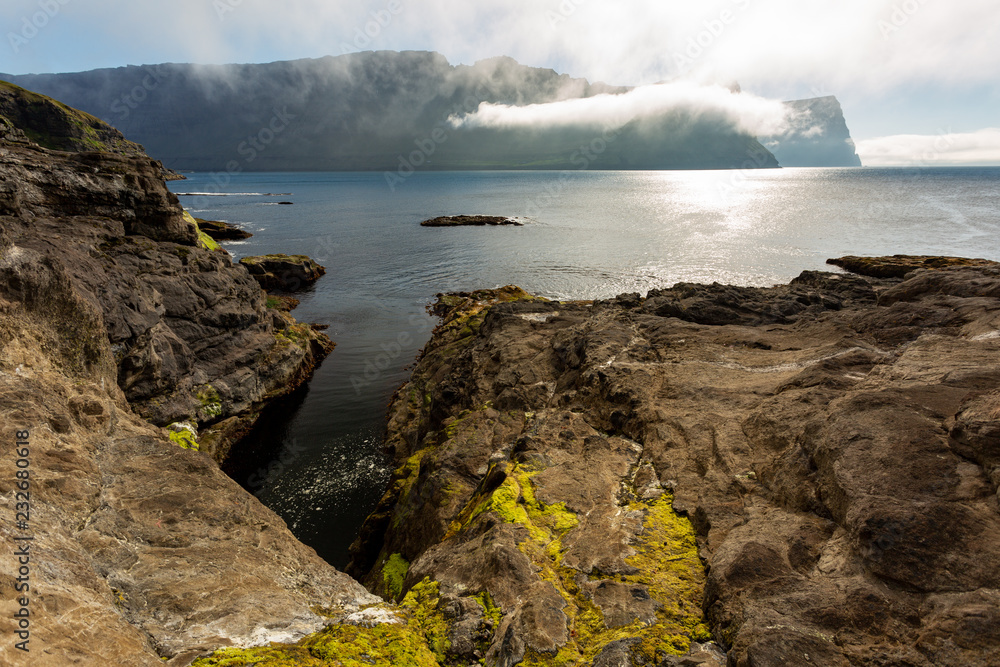 Beautiful shorelines in Faroe Islands filled with colourful algae