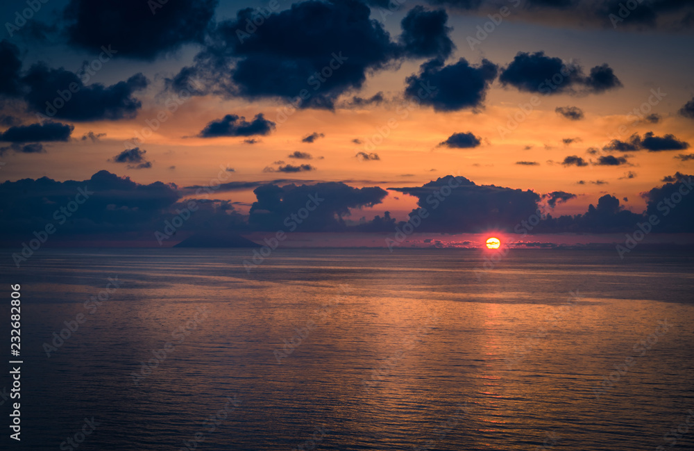 Aerial view of beautiful amazing sea sunset with color dramatic sky