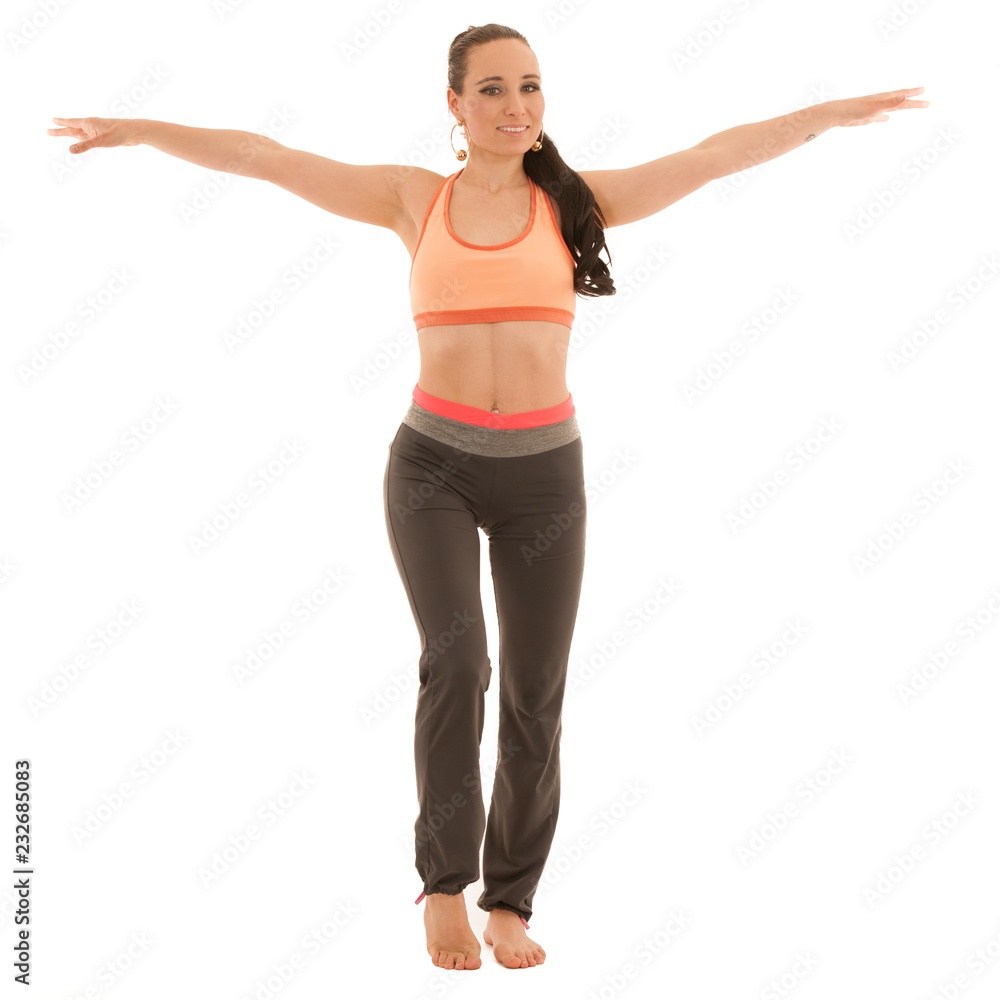 Young woman practice yoga standing isolated over white background Young woman practice yoga standing isolated over white background