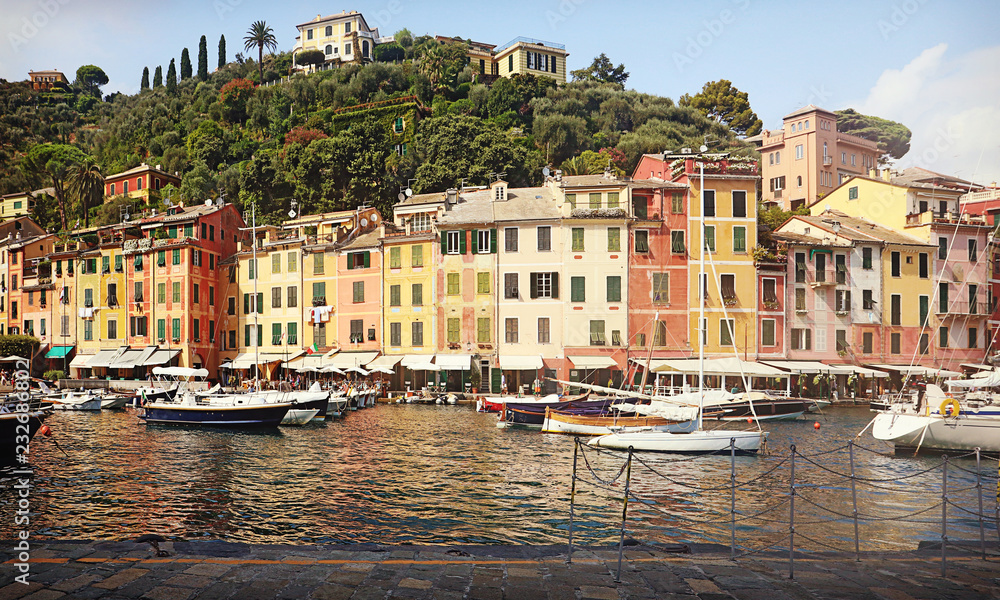 Picturesque view of Portofino waterfront with the brightly colored buildings, coffee shops and restaurants line