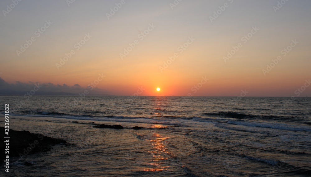 Sunset view at black sea coast, in summer, wavy beach